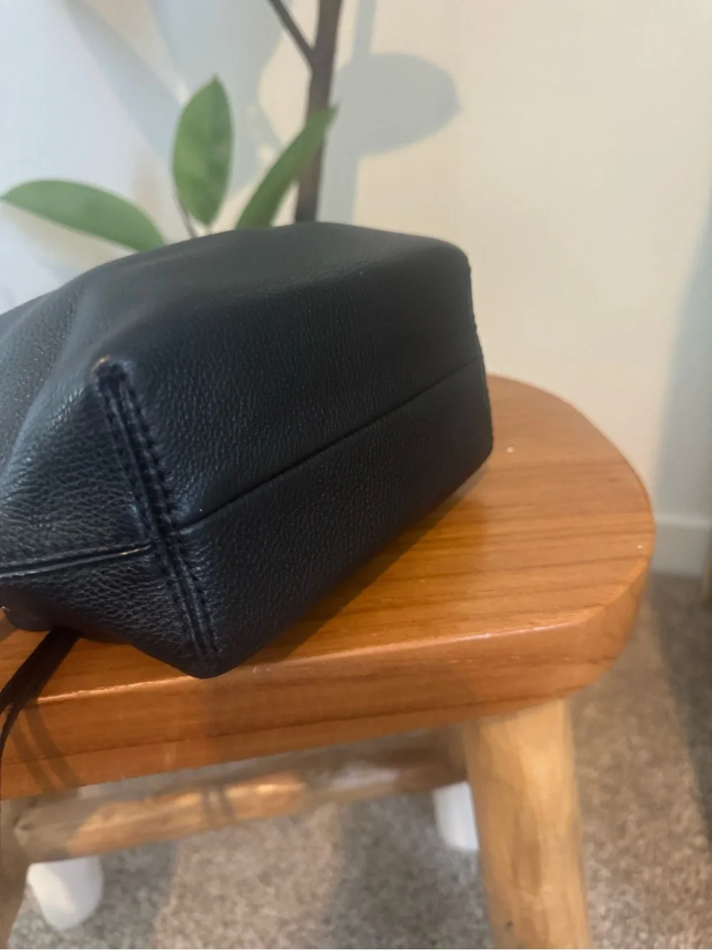 kate spade black pebbled leather tassel drawstring crossbody bag